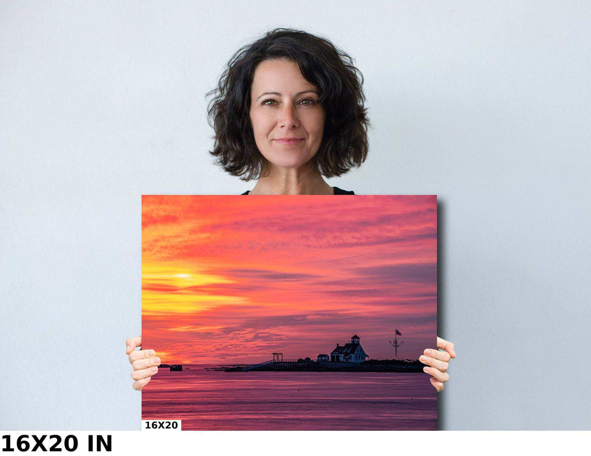 Kittery Maine Photography print of a coastal station silhouetted against vivid pink and orange sunrise skies over calm water