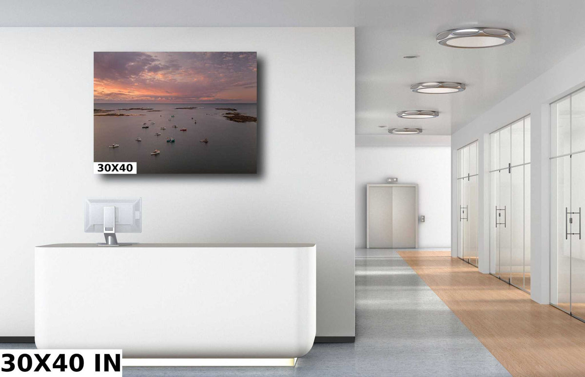 Coastal harbor wall art in muted sunset colors, featuring fishing boats and shoreline on a rectangular canvas; Maine Coastal Wall Art