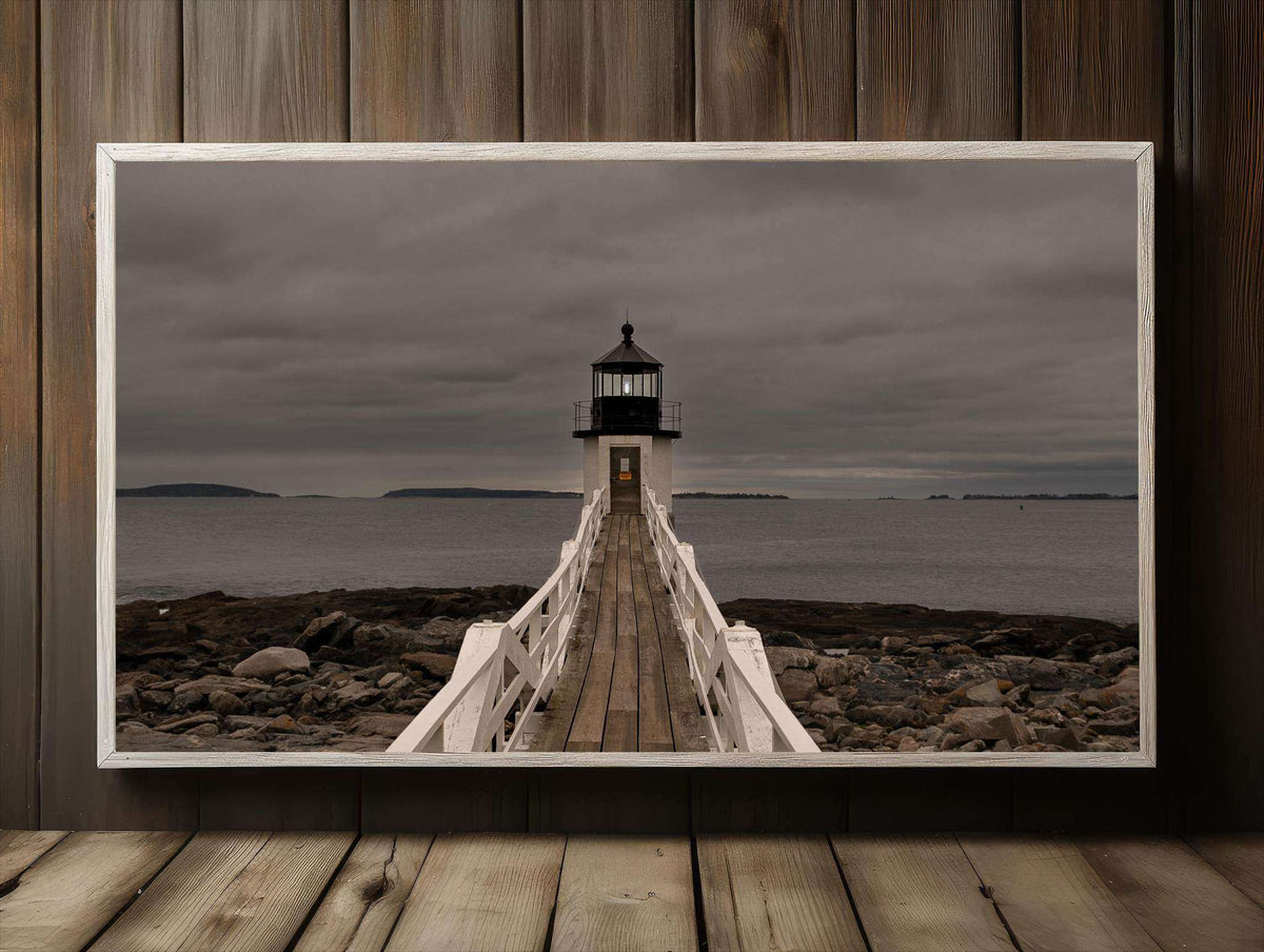 Marshall Point Lighthouse Print featuring a muted gray stormy seascape, rocky shore, and white-railed wooden walkway