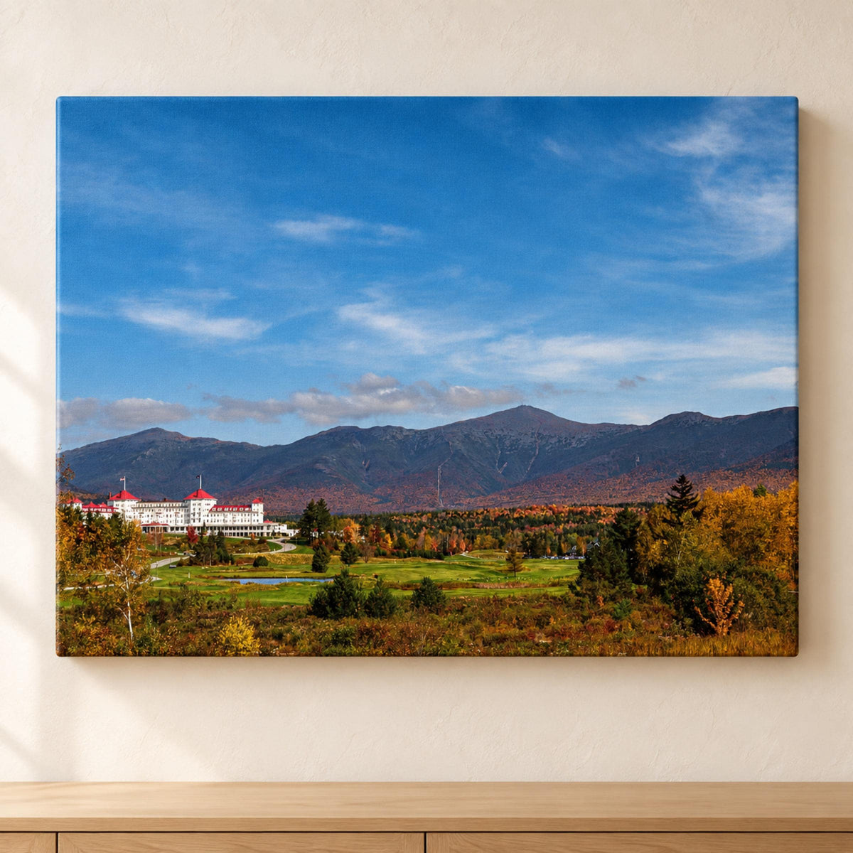 Mount Washington Hotel Autumn print showing a white hotel with red roofs, colorful fall trees and mountain range
