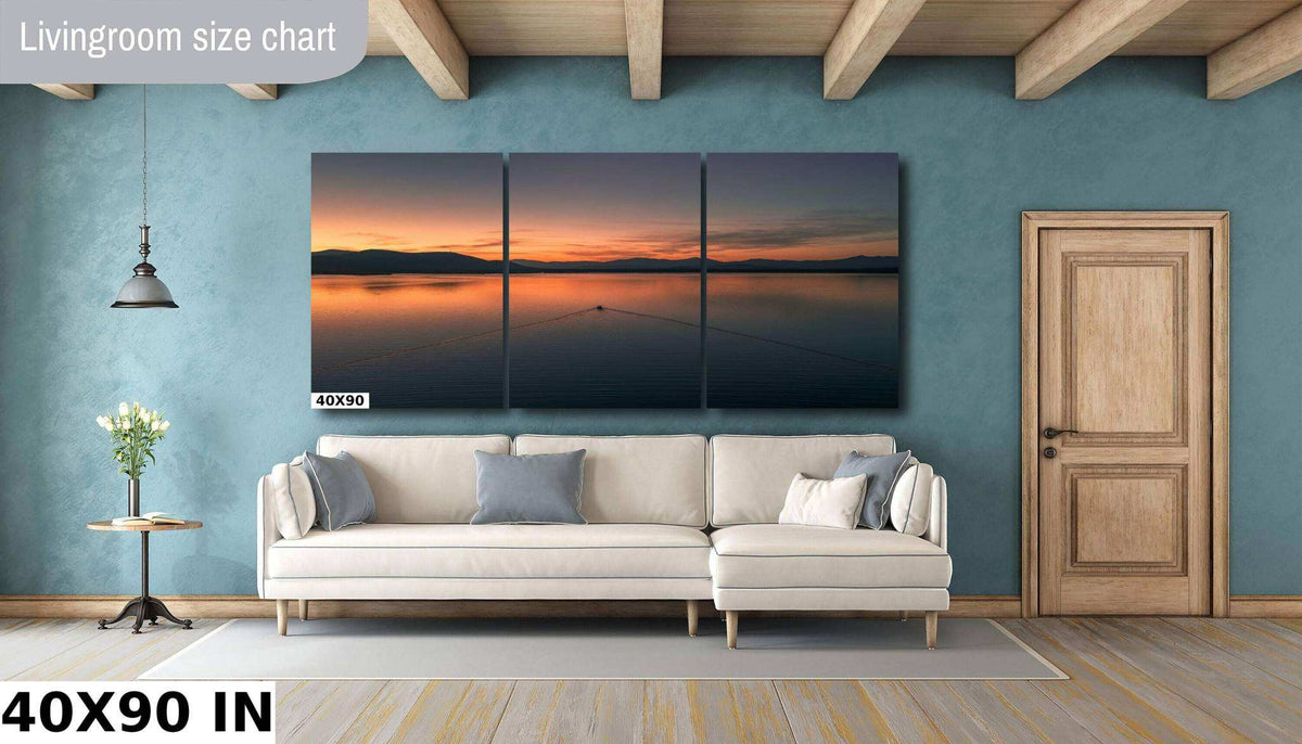 Ossipee Lake Wall Art shows a three-panel lake landscape with an orange sunset, dark mountain silhouettes, and calm water