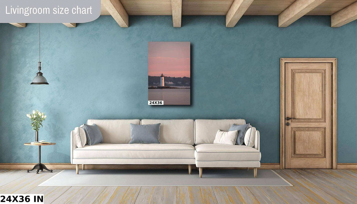 Portsmouth Harbor Lighthouse Art shows a coastal lighthouse in pink sunrise tones in a framed 24x36 wall print.