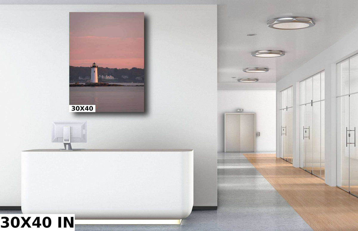Portsmouth Harbor Lighthouse Art print, a tall photo of a white lighthouse across calm water beneath a pink sunrise sky