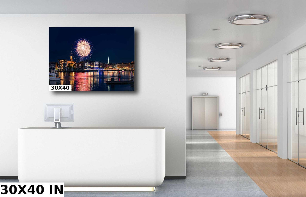 Portsmouth NH Fireworks Print showing a colorful burst above a waterfront city at night, reflected on the harbor
