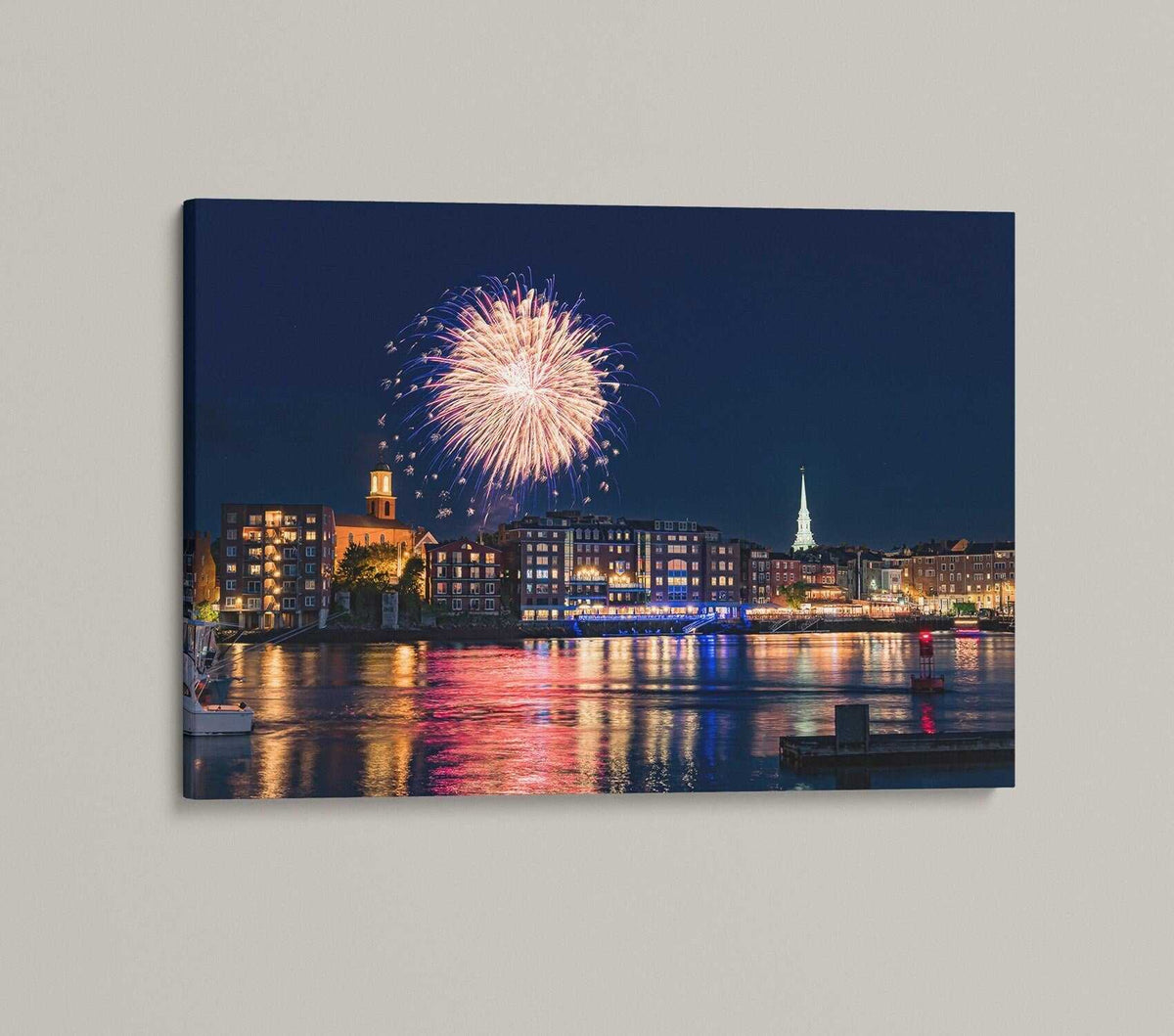 Portsmouth NH Fireworks Print featuring a golden burst over a waterfront town, reflected in harbor water at night