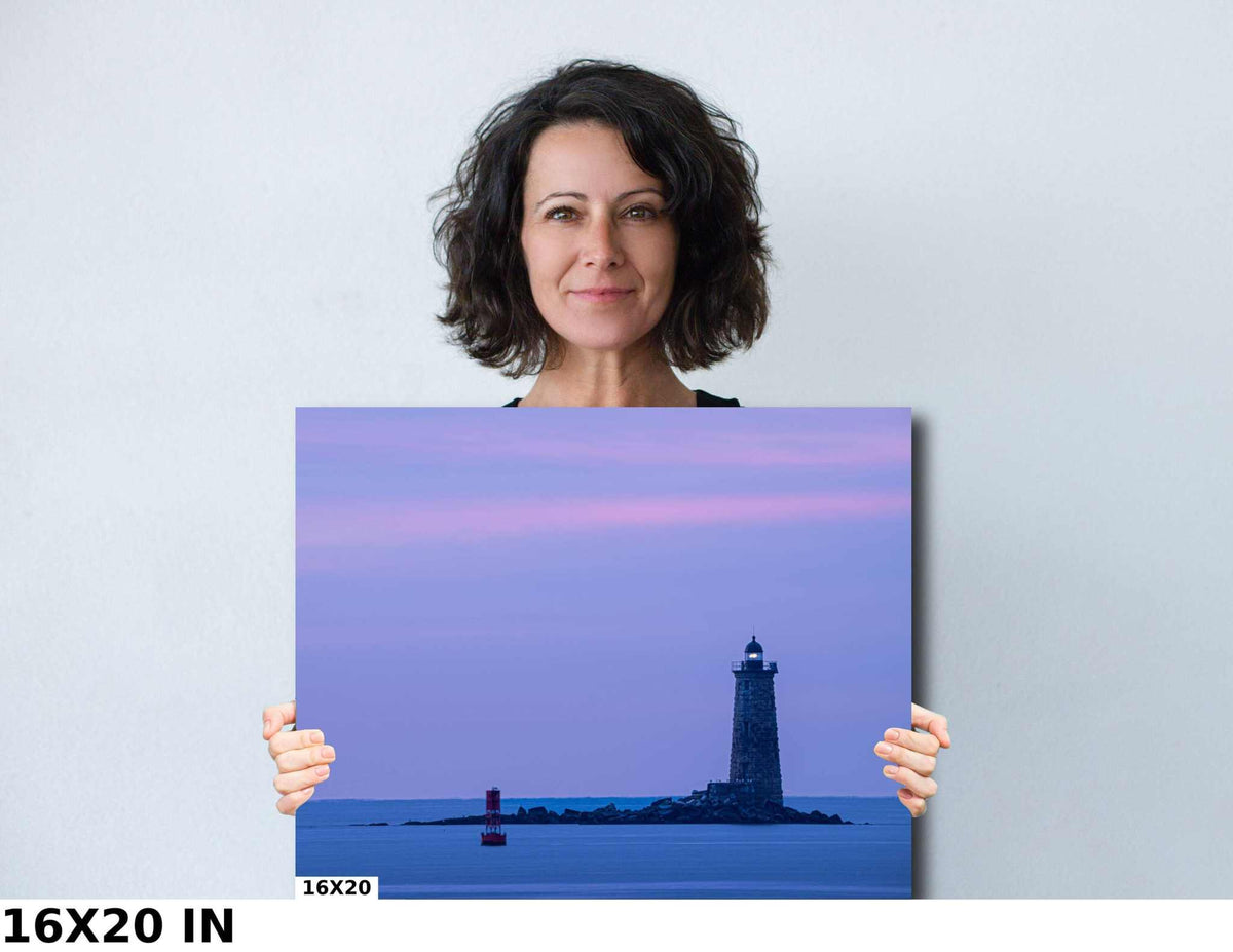 Whaleback Lighthouse Print featuring a dark coastal lighthouse on a rocky shore beneath a pastel purple and pink sky