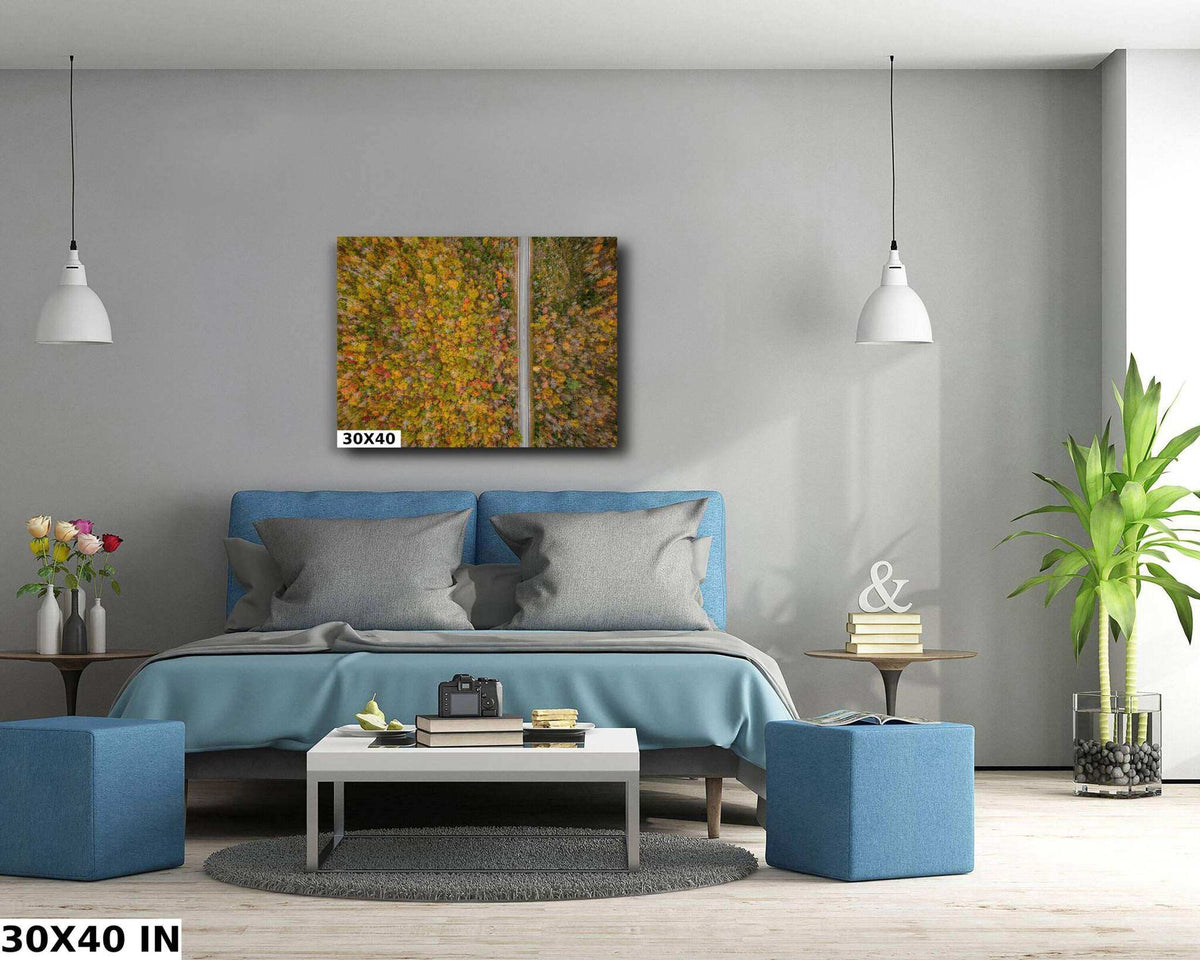 White Mountains Fall Print showing a framed autumn forest canopy in orange, gold, and green with a pale vertical line