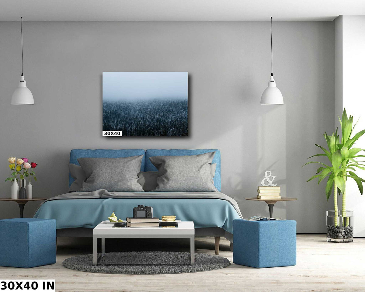 Winter Forest Wall Art featuring a dark blue snowy evergreen forest fading into pale mountain fog